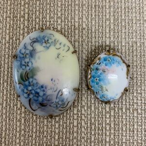 Lot of 2 Vintage Hand-Painted Brass over Porcelain Blue Forget Me Knots Brooches